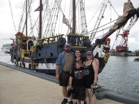 The family in front of the Jolly Roger